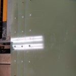 All of the holes drilled into the fins.